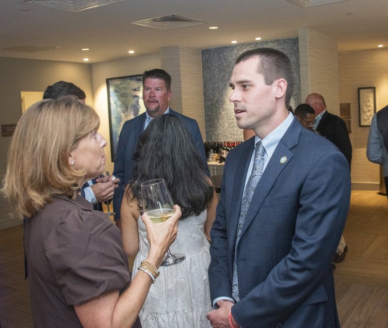 Lisa Borin Ogden, Rehoboth Beach city solicitor, converses with Evan Miller, assistant city manager.